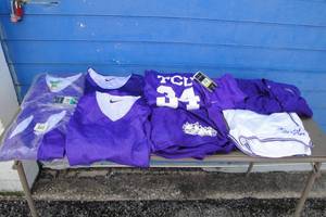 lot 53 image: Lot Of TCU- Jerseys, Shorts And Jackets, See Photos