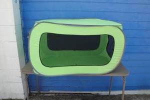 lot 56 image: Portable  Collapsble Pet Crate, Nylon Mesh. About 35-L x 21 x 21