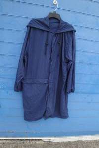 lot 69 image: LOT-20-DeMoulin Marching Band Weather Cover-Ups With Hood, Folds into Its Own Pouch, Mixed Sizes