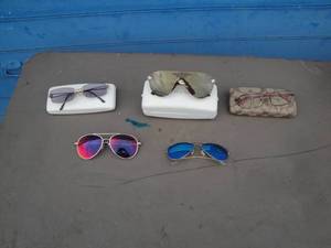 lot 109 image: 6-Pair Of Brand Name Sunglasses, 1-Coach, 2-Versace, -1-Polar Eyes And 2-Aviator Style Not In Cases