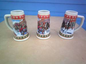 lot 38 image: 3-1993 Budweiser Hometown Holidays, From The Holiday Strin Collection Series Steins By Ceramarte-Brazil. Note 3 X Money