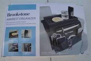 lot 12 image: Brookstone Armrest Organizer For Couch Or Armrest-In Box