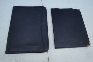 lot 25 image: 2-Black Port Folios, 1-Zippered And 1-Fold Over