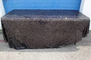 lot 64 image: About-10-Ft Round Black Sequined Tablecloth Cover