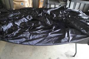 lot 71 image: 8-Ft. Round Black Satin Like Tablecloth Cover