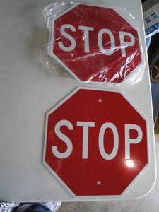 lot 86 image: 2- New 12-Metal Stop Signs, Note 2 X Money