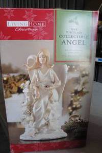 lot 102 image: Fine Porcelain Collectable Angle By Living Home Christmas