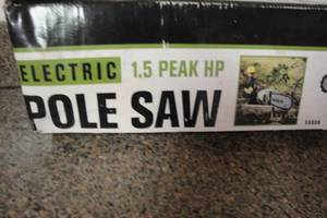 lot 4 image: Portland 16, 1.5 Peak HP Electric Pole Chainsaw- Plugged in to Test- Works- Looks Complete, looks Like Never Out Of Box.
