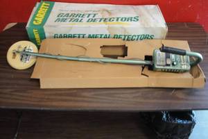 lot 128 image: GARRETT The American S-1, Deep Scan, TR-Discriminator, Metal Detector With X Co-Planar Coil, Battery Operated, Batteries Not Included, From Garrett-Garland, Tx.