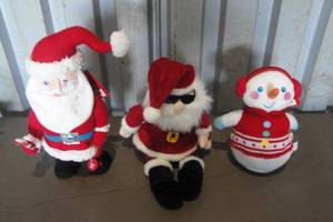 lot 138 image: Lot- 3- Battery Operated Singing Holiday Plush Figures, 2-Santas And 1-Snowman- Works- May Need New Batteries