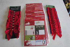 lot 142 image: 24-Packs Of 50-Gift Tags Per Pack And 2-Packs Of Red Bows