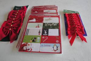 lot 145 image: 24-Packs Of 50-Gift Tags Per Pack And 2-Packs Of Red Bows