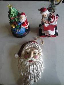 lot 151 image: 3-Toliday Santa Decorations, 2-Battery Operated And 1-Plaster Santa Face, No Batteries Included.