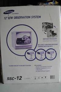 lot 150 image: Samsung Model SSC-12, Security System, 12 B & W Observation Monitor And 3-Cameras, In Box Looks Unused