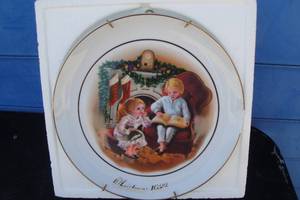 lot 224 image: 1983- Enjoying The Night Before Christmas, Gold Trimmed Avon Collectors Plate With Hanger, In Box, About 9-Rd, Chipped