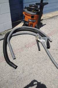 lot 251 image: Ridge 5-Gallon Wet  Dry Shop Vac, With Hoses And Attachments, On Casters, Works