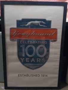 lot 18 image: Greyhound 100 Year Anniversary Wall Decor---26x39