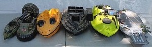 lot 42 image: Nice Selection of Plastic RC and Toy Boats Including an Aircraft Carrier with Diecast Planes--Not in working condition