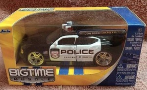 lot 67 image: Jada Big Time Muscle 132 Scale 2006 Dodge Charger Police Cruiser