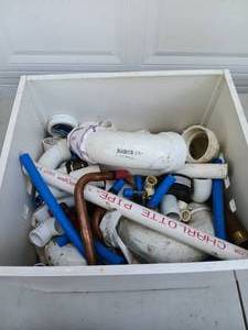 lot 108 image: Crate full of PVC and Plumbing Pipes and Accessories