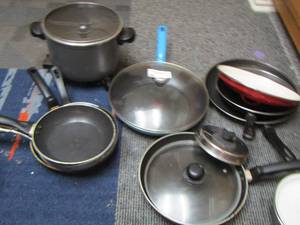 lot 75 image: Large lot of pots and pans some with lids