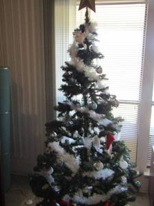 lot 82 image: 5.5ft green Christmas tree with ornaments - gold star