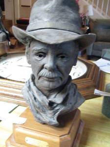 lot 20 image: SCULPTURE  - Drover Ceramic head statue, 1412 tall- By Jennie Johnson