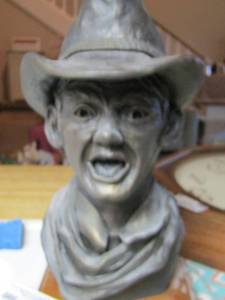lot 13 image: SCULPTURE  - HOLY COW STAMPEEEED statue By Jennie Johnson 14 12 tall