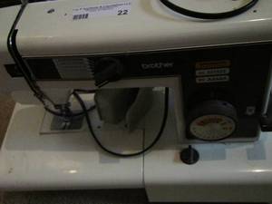lot 22 image: Brothers sewing machine with foot peddle