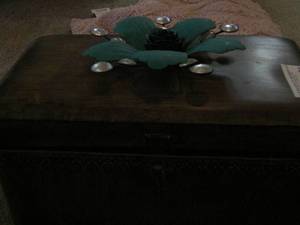 lot 24 image: brown metal box with green metal flower on top