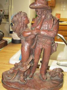 lot 100 image: SCULPTURE  Western couple statue BY L4RG0 limited edition - 13 12 tall