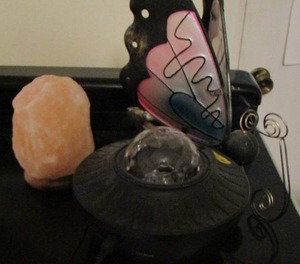 lot 116 image: rock salt lamp, disco wall light, metal butterfly art