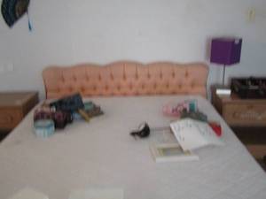 lot 16 image: pink padded head board with metal frame