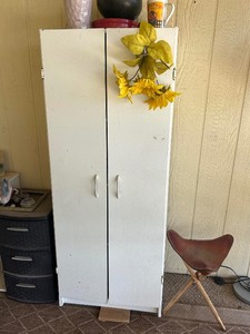 lot 148 image: DOUBLE DOOR WHITE CABINET  AAPROX 72 H  X 24 W
