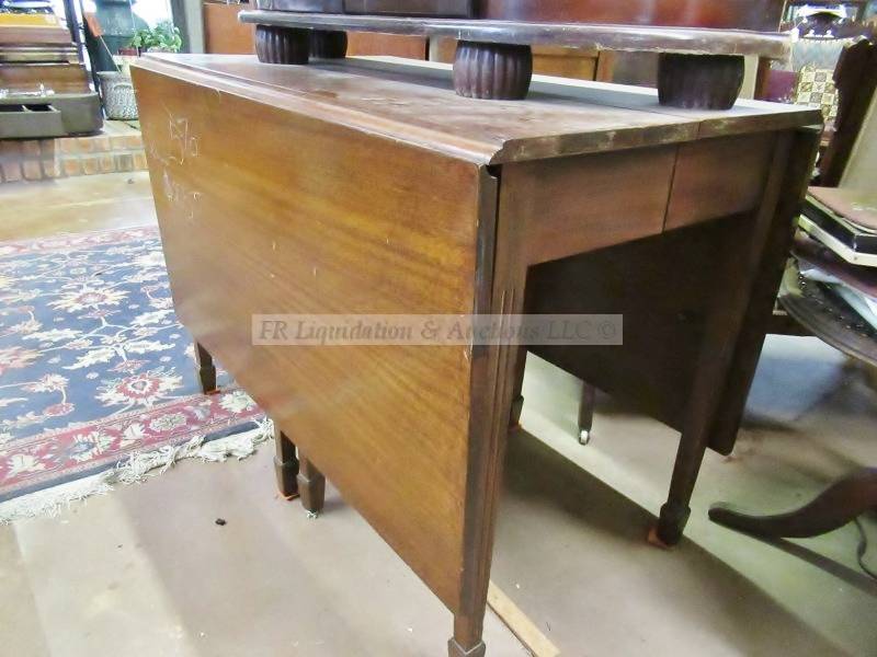 lot 159 image: Mid century mahogany drop leaf dining table