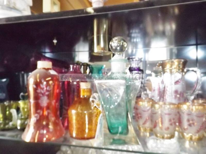 lot 62 image: Various colored glassware