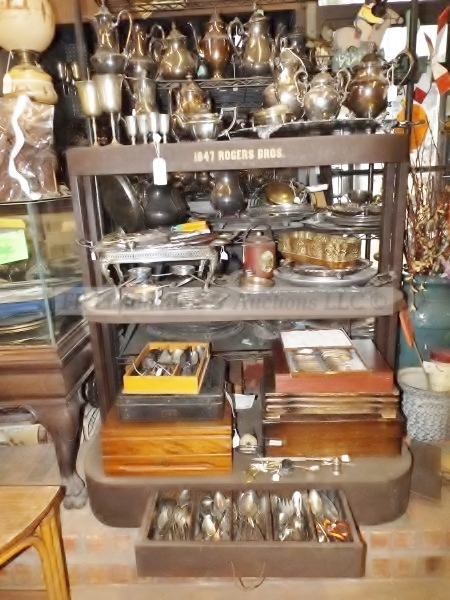 lot 131 image: Rogers Bros display shelf and silver plate contents