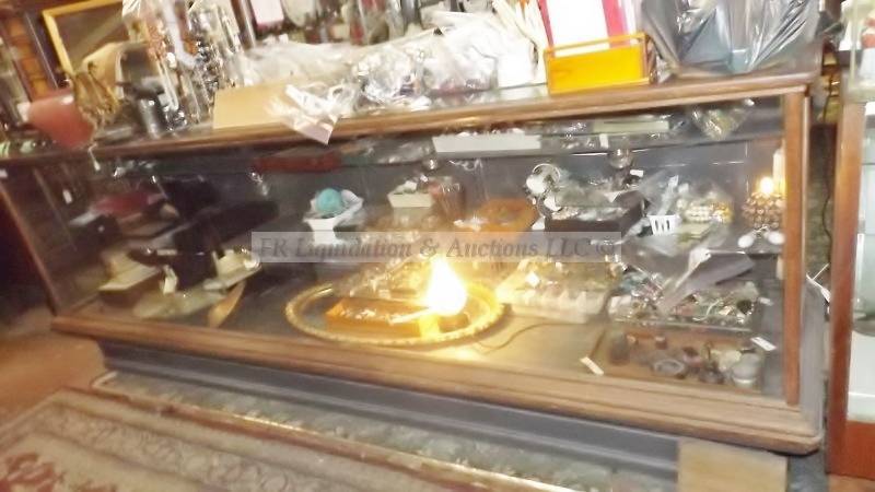 lot 857 image: Wood trim display cabinet