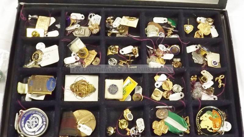 lot 814 image: Glass topped riker tray with lapel pins