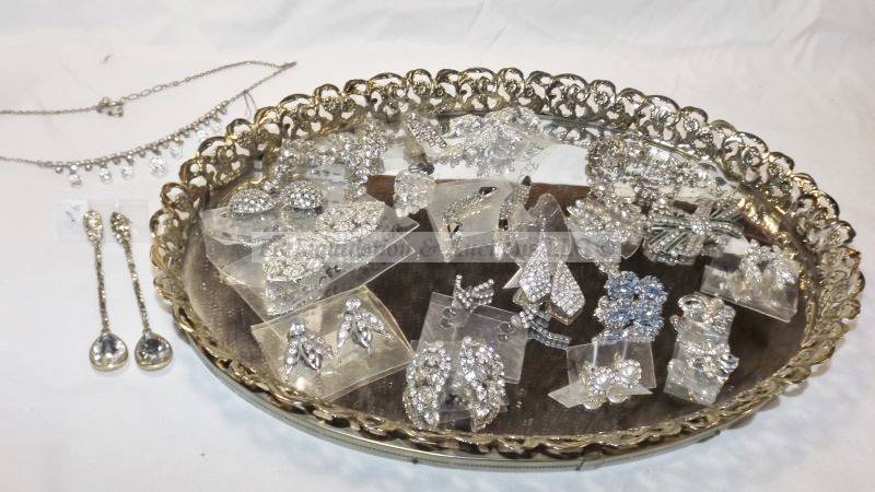 lot 801 image: Mirrored tray of rhinestone and crystal earrings and more