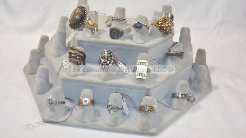 lot 800 image: Assorted rings on display stand