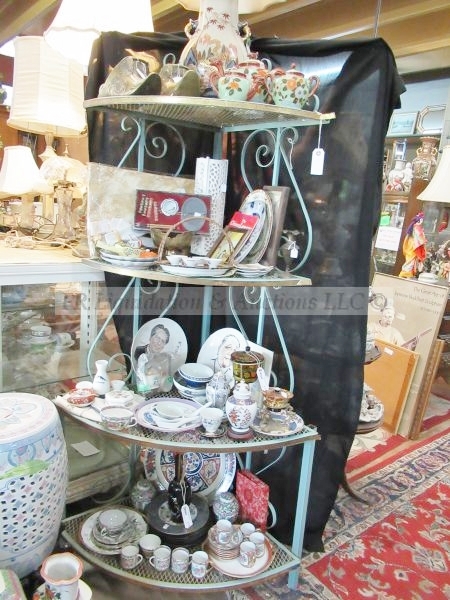 lot 174 image: Wrought iron corner display rack