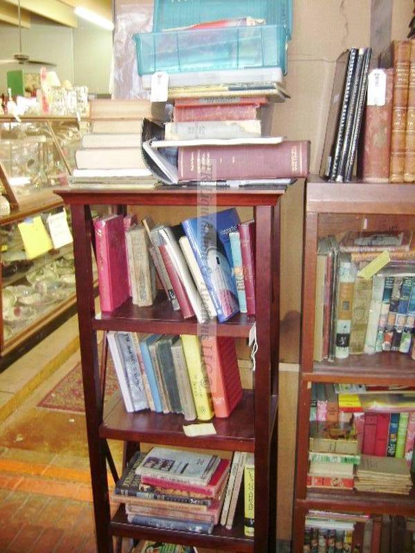 lot 330 image: Wood bookshelf and books