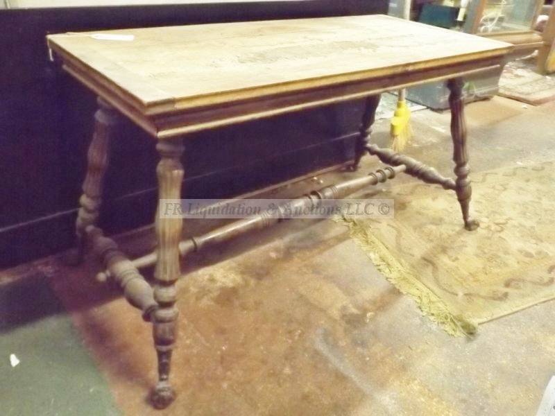 lot 738 image: Oak coffee table with eagle talon feet