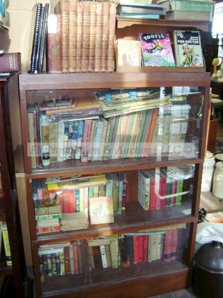 lot 329 image: Wood bookshelf and books