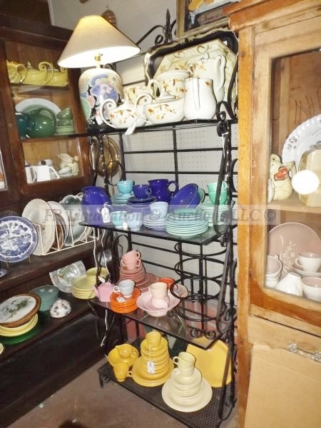 lot 683 image: Wrought iron bakers rack