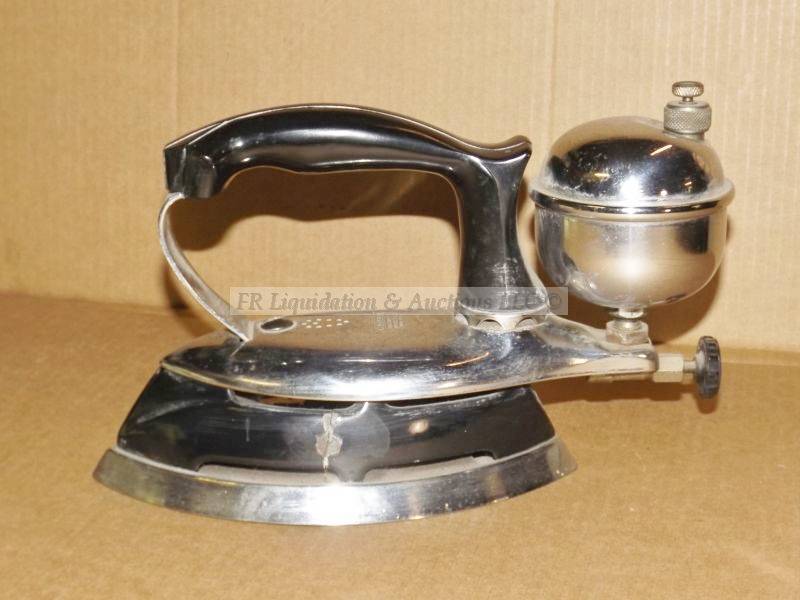 lot 668 image: 1940s Coleman gas operated iron