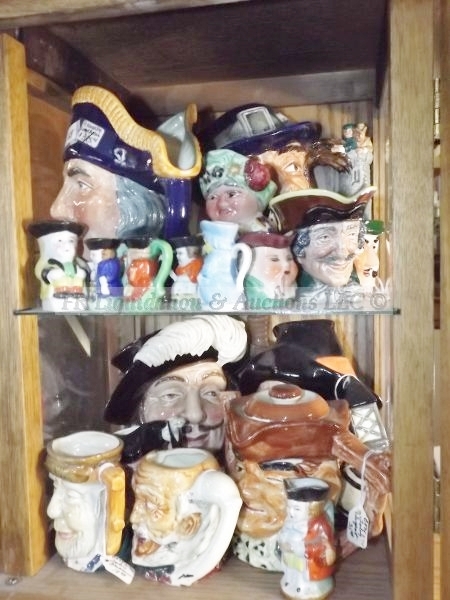 lot 606 image: Royal Doulton head mugs & more