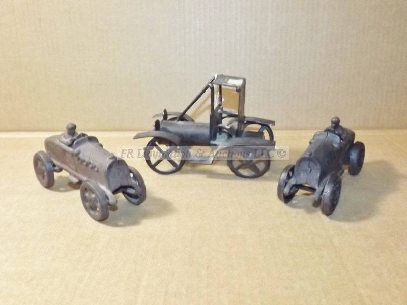 lot 627 image: Antique cast iron toy cars