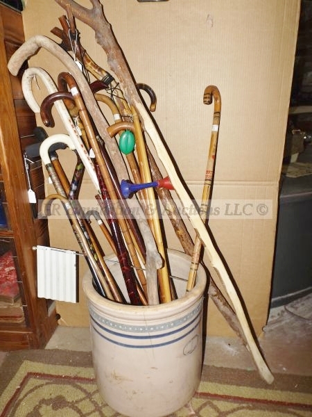 lot 459 image: Canes & walking sticks in Marshall crock